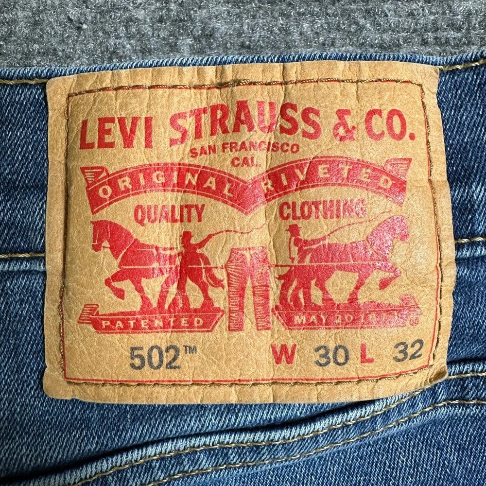 Levis 502 Regular Taper Jeans Mens 30x31 Medium Wash Blue WaterLess Denim
